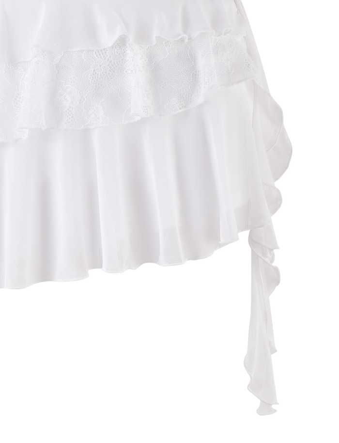 The AVALYN SKIRT - WHITE by TIGERMIST features white ruffled fabric with lace trim and layered, sheer textures, adding delicate elegance to any look.