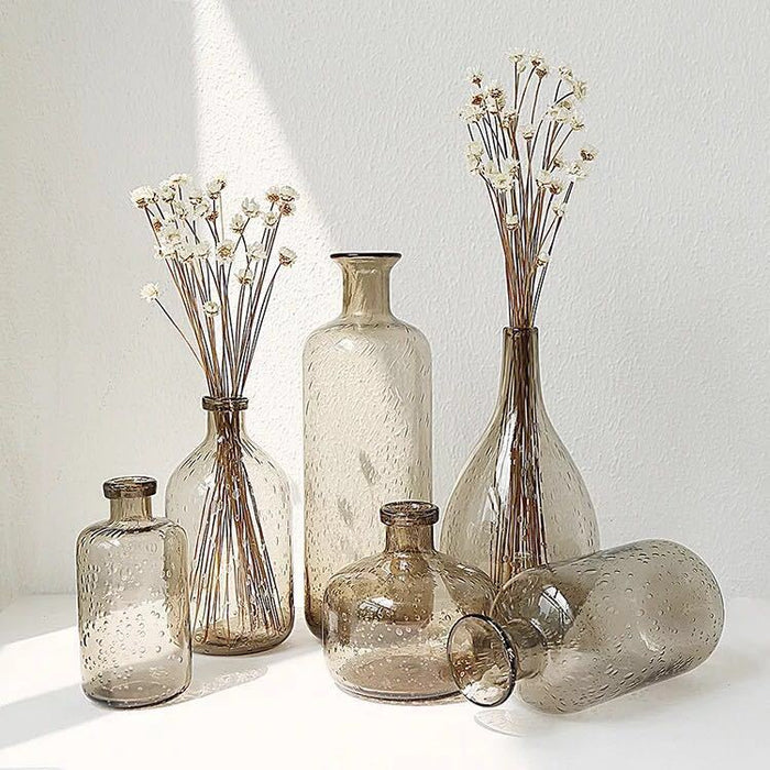 Bubble glass vase with flowers for home decoration