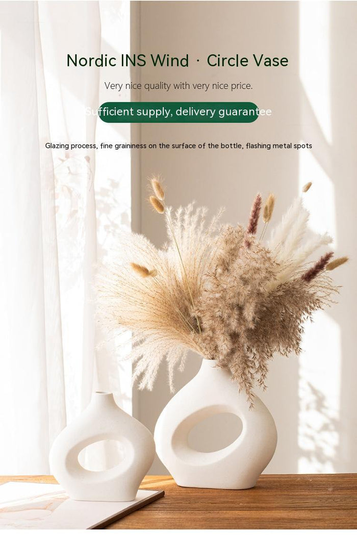 Ceramic circle vase decorations with artificial flowers for interior decor