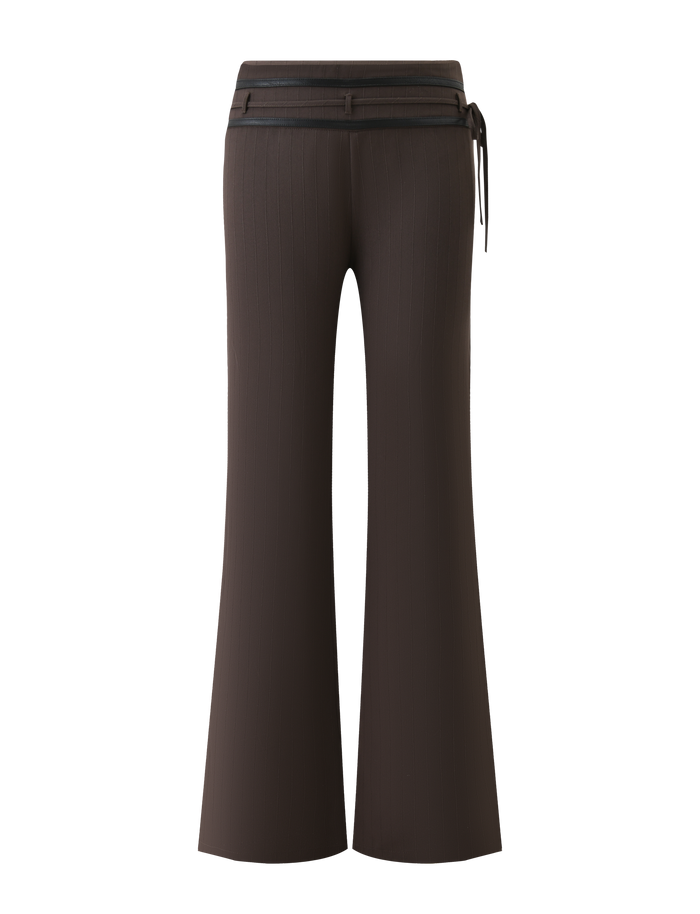 Back view of TIGERMIST FEDRA PANT - CHOCOLATE: high-waisted tailored pants with subtle vertical stripes, black waistband, side tie detail, and an elongated flared silhouette.