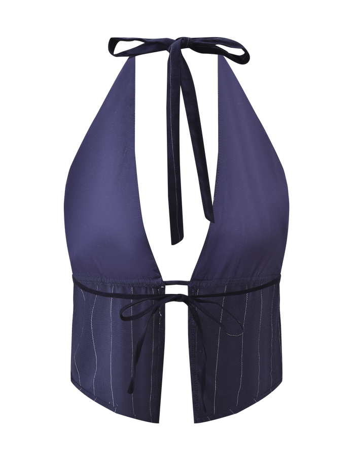 The LAINEY TOP - NAVY PINSTRIPE by TIGERMIST is a navy halter neck crop top with an adjustable halter, deep V neckline, front tie closure, and subtle navy pinstripe linen on the lower half.