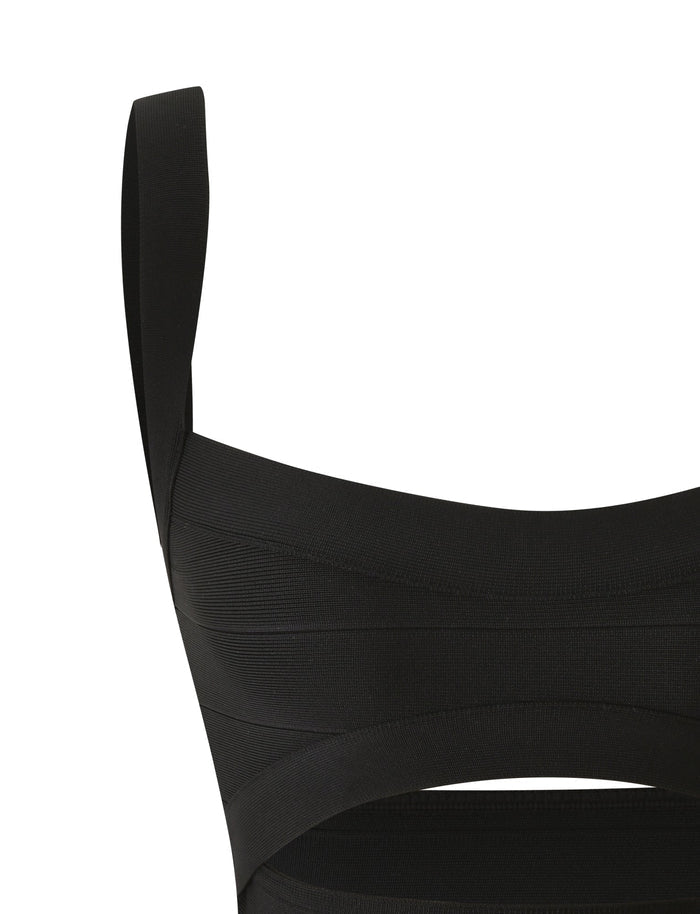 Close-up of the LIEL BANDAGE TOP - BLACK by TIGERMIST, featuring a sleeveless design with thick straps and a horizontal layered fabric pattern. Made from sculpting bandage material, this crop top offers a flattering bodycon fit. The image shows the bottom portion of the top slightly cut off.