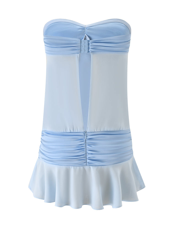 The TIGERMIST LUX MINI DRESS in baby blue features a strapless design, sweetheart neckline, ruched bust and waist, center cutout, and flared ruffle hem—perfect for summer.
