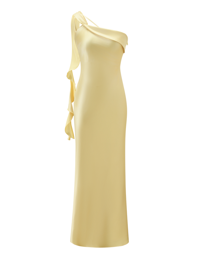 The RAINEY MAXI DRESS by TIGERMIST features a sleek satin silhouette in butter yellow, an asymmetrical one-shoulder neckline, and a cascading draped ribbon for an elegant, floor-length look.