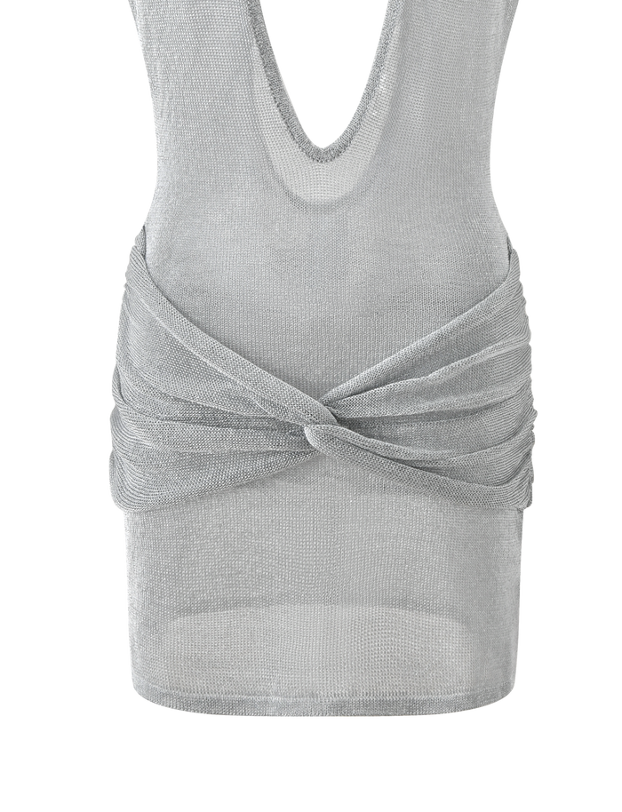 The ZOSIA MINI DRESS by TIGERMIST is a sleeveless silver knit mini with a deep V neckline, draped twisted drop waist, and sheer fitted fabric for a striking, alluring metallic look.